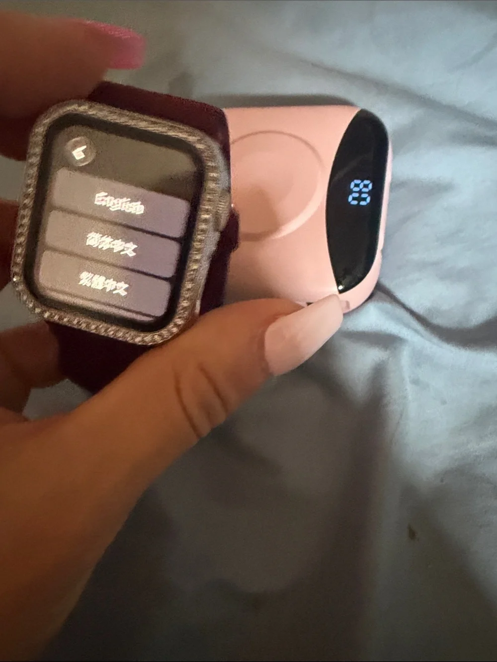 Apple Watch with Burgundy Woven Band, Pink Protective Case and Rhinestone Bezel